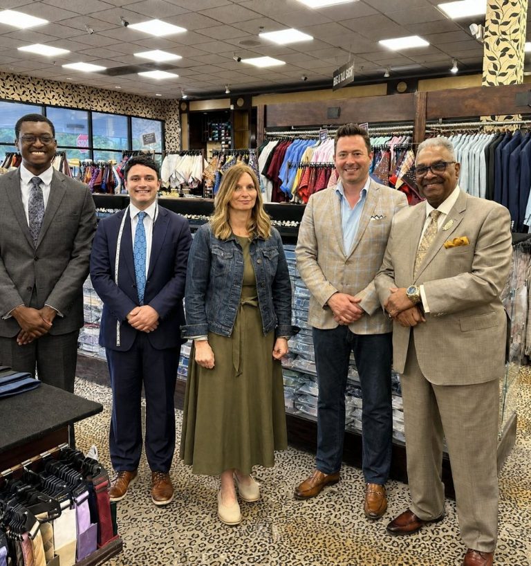 The Suit Depot team on the showroom floor in Oak Park.